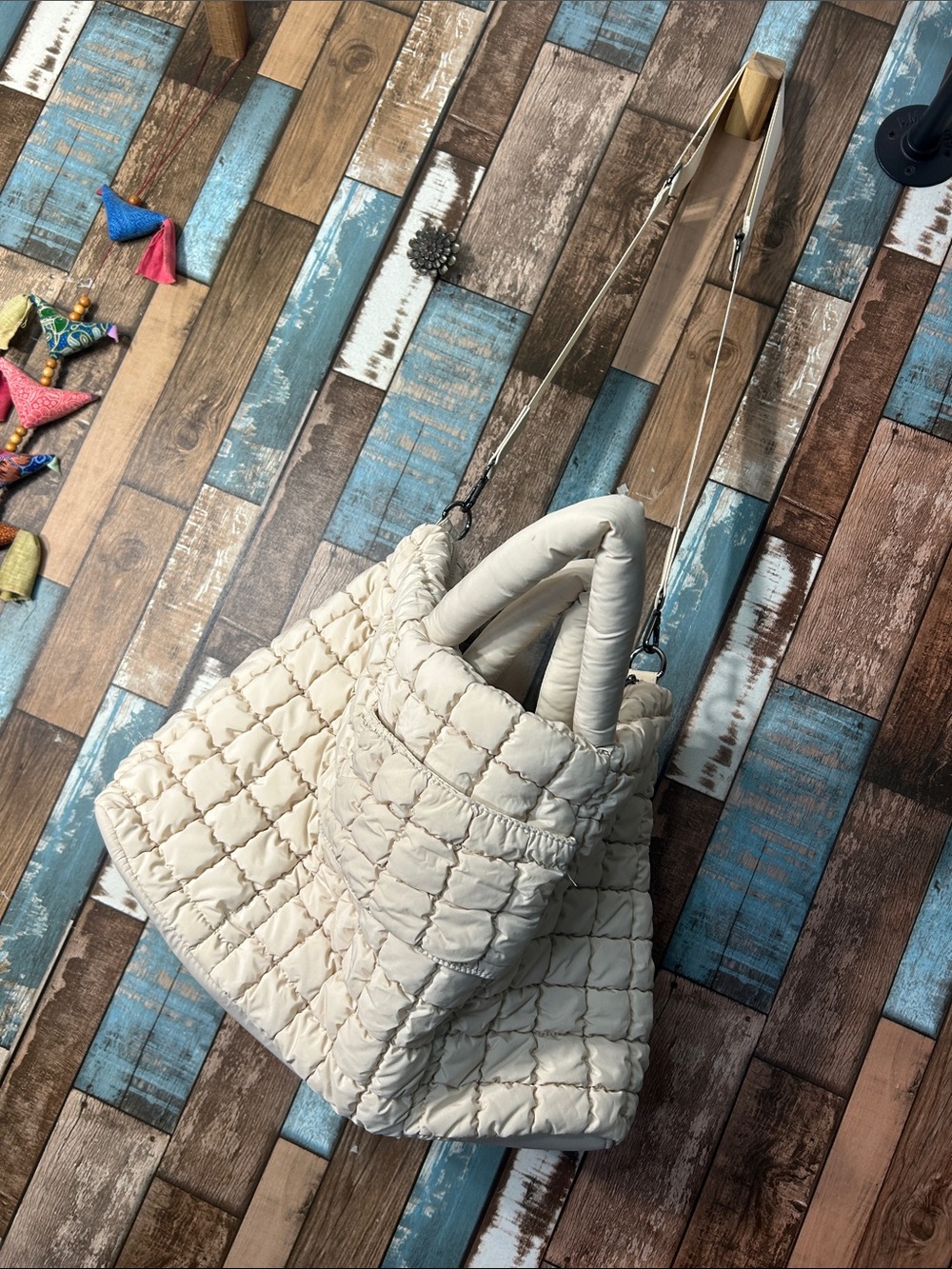 Giant puffer cream travel crossbody bag